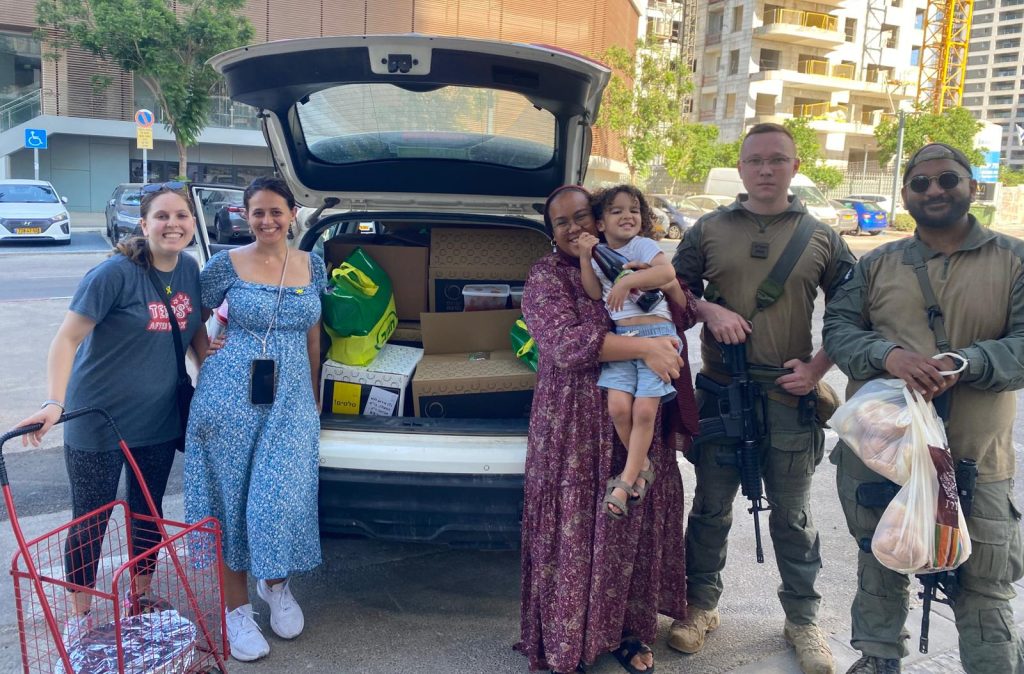 JLIC members bring supplies to soldiers who have been stationed in the local community during Operation Rising Lion